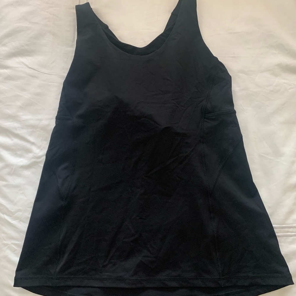 Lululemon lightly used black tank top with built in shelf bra. Size 12